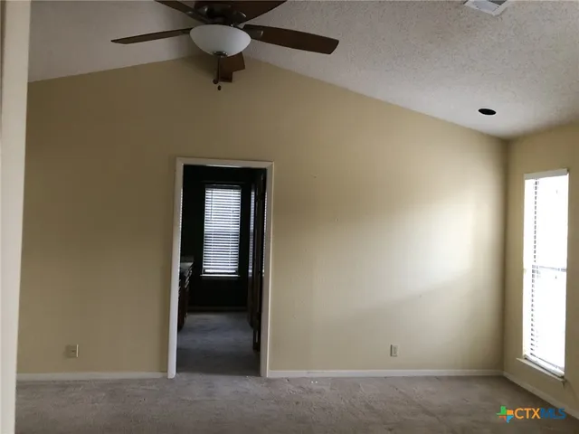 a view of swimming pool from a window