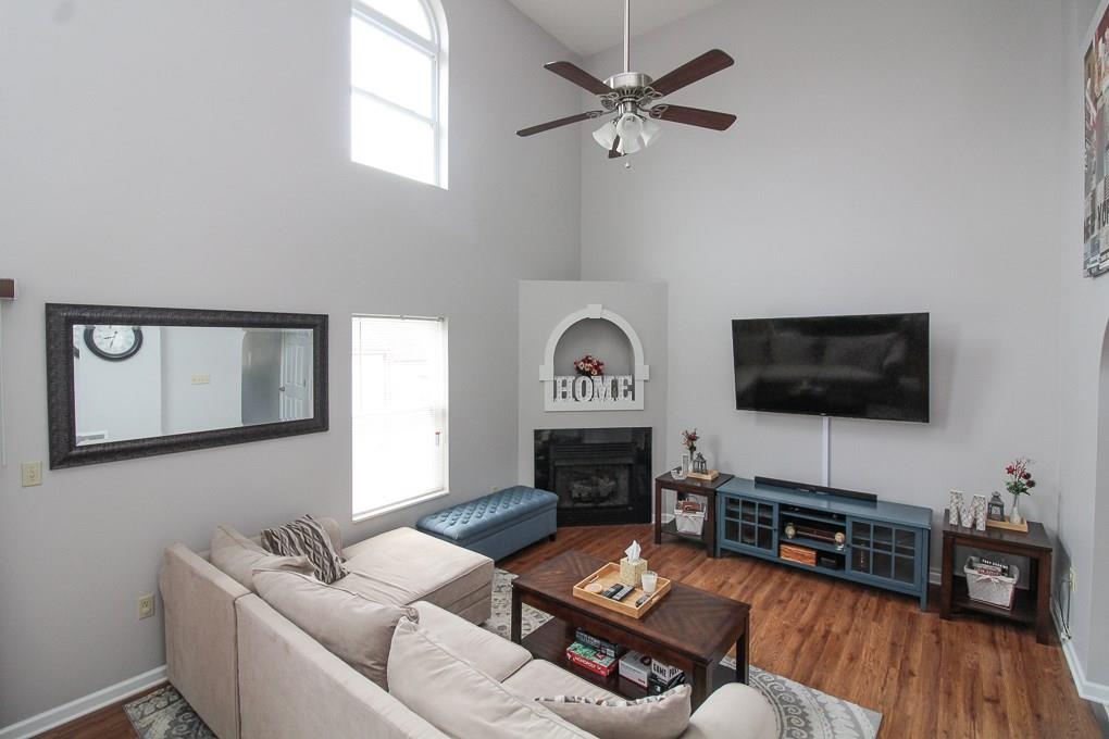 1019 Rural Ridge Drive Cheswick, PA 15024 - Photo 2 of 25 Light and Bright living room with 2 story cathedral ceilings and corner fireplace