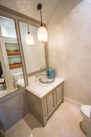 a view of a hallway with staircase