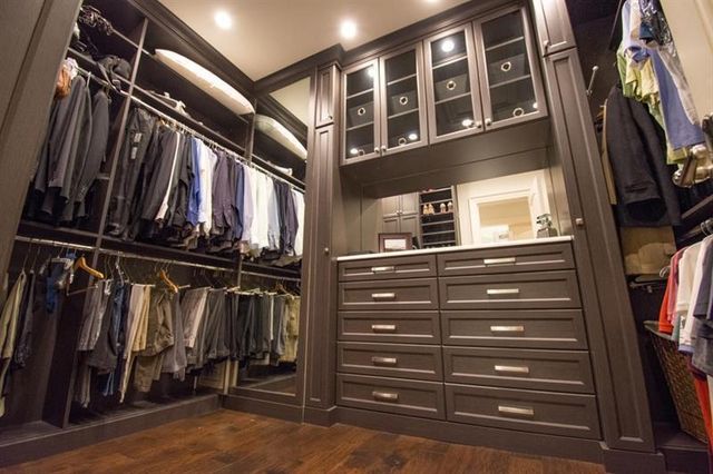 a spacious bathroom with a tub shower and sink