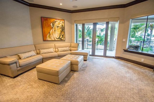 a view of swimming pool with outdoor seating