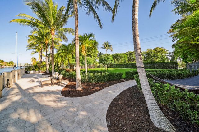 a view of a swimming pool with chairs