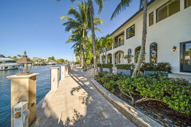 a view of a water fountain in front of the house