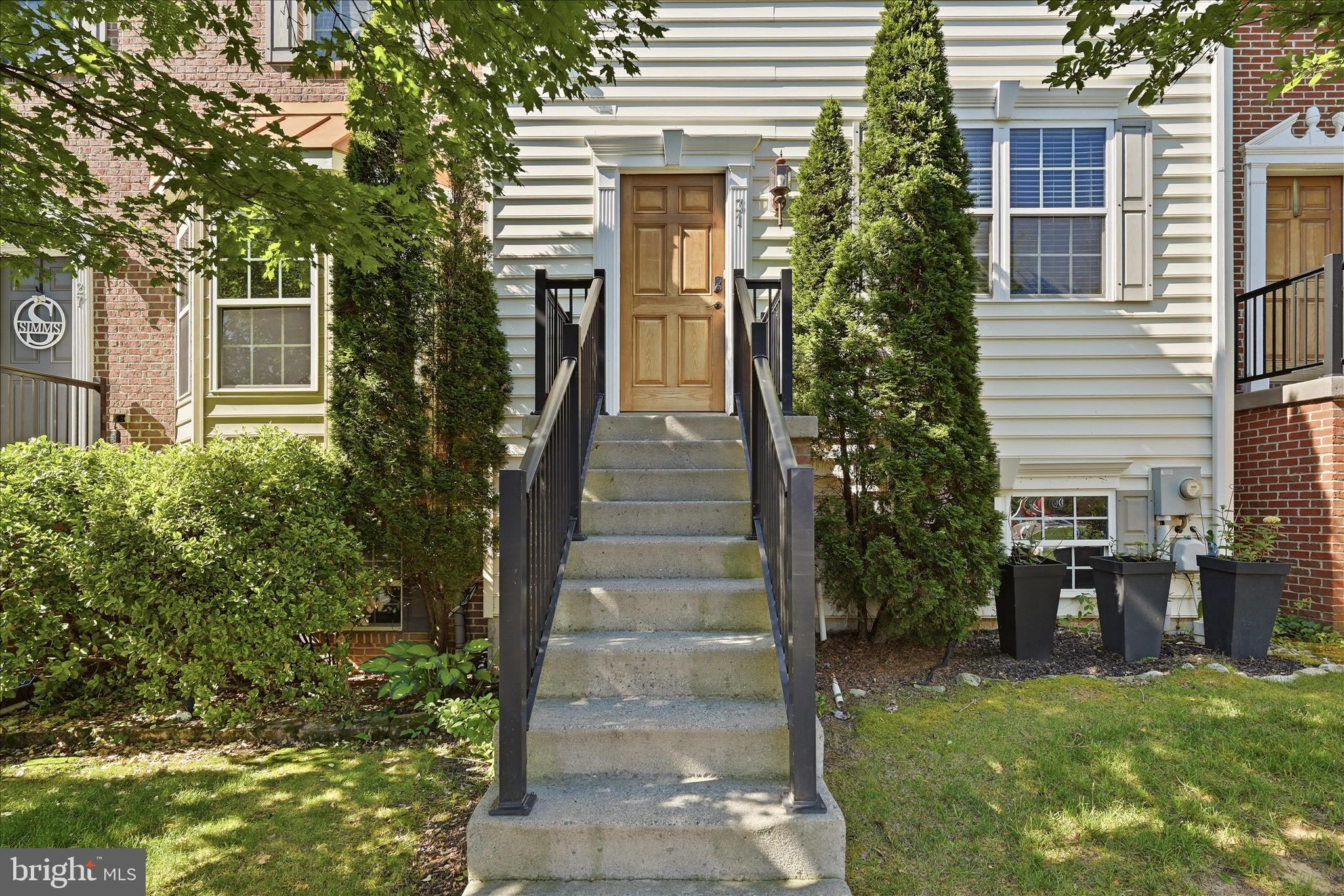 31 Riparian Lane Ranson, WV 25438 - Photo 3 of 56 Spacious 3-level townhome backing to trees