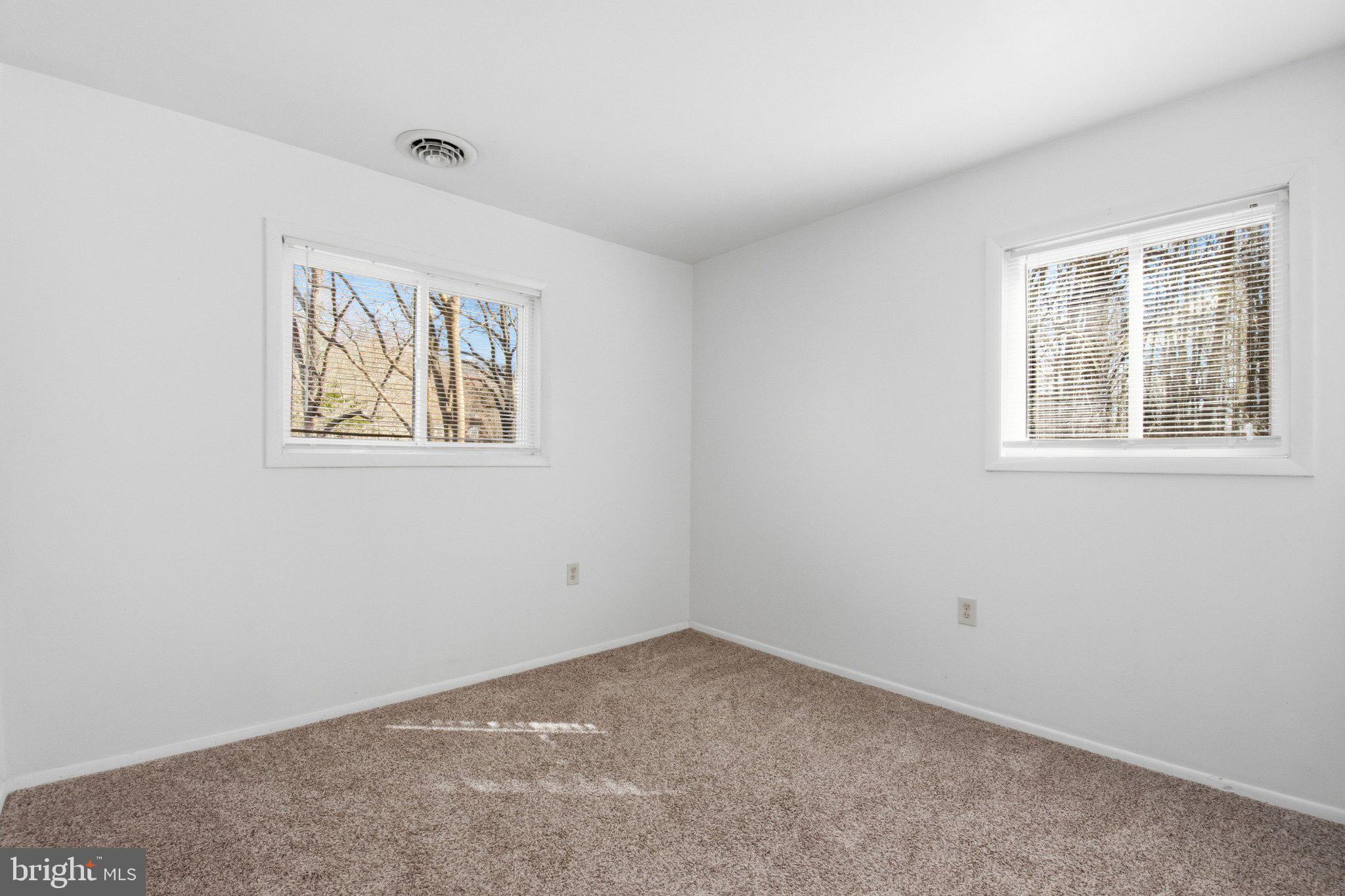 1469 Cedarhurst Road Shady Side, MD 20764 - Photo 12 of 19 an empty room with windows