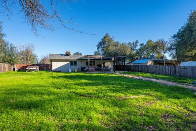 a view of a house with a big yard
