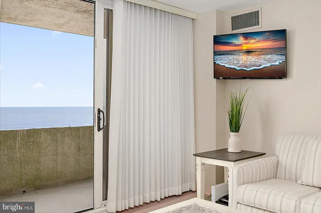 a view of a livingroom with furniture and window