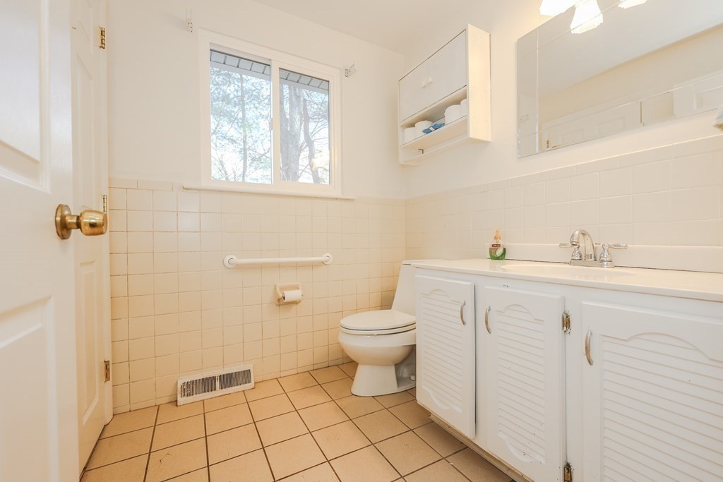 354 Gorwin Drive Holliston, MA 01746 - Photo 17 of 25 a bathroom with a sink toilet and shower