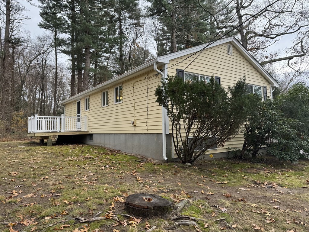 354 Gorwin Drive Holliston, MA 01746 - Photo 2 of 25 a view of a house with a yard