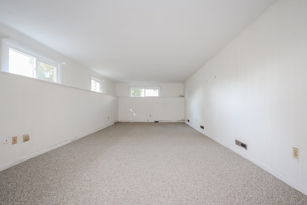 354 Gorwin Drive Holliston, MA 01746 - Photo 21 of 25 an empty room with a window