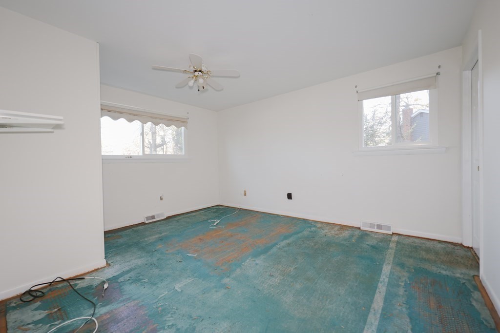 354 Gorwin Drive Holliston, MA 01746 - Photo 24 of 25 an empty room with windows