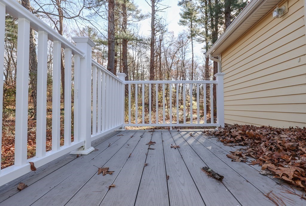 354 Gorwin Drive Holliston, MA 01746 - Photo 25 of 25 a view of backyard with wooden floor and fence