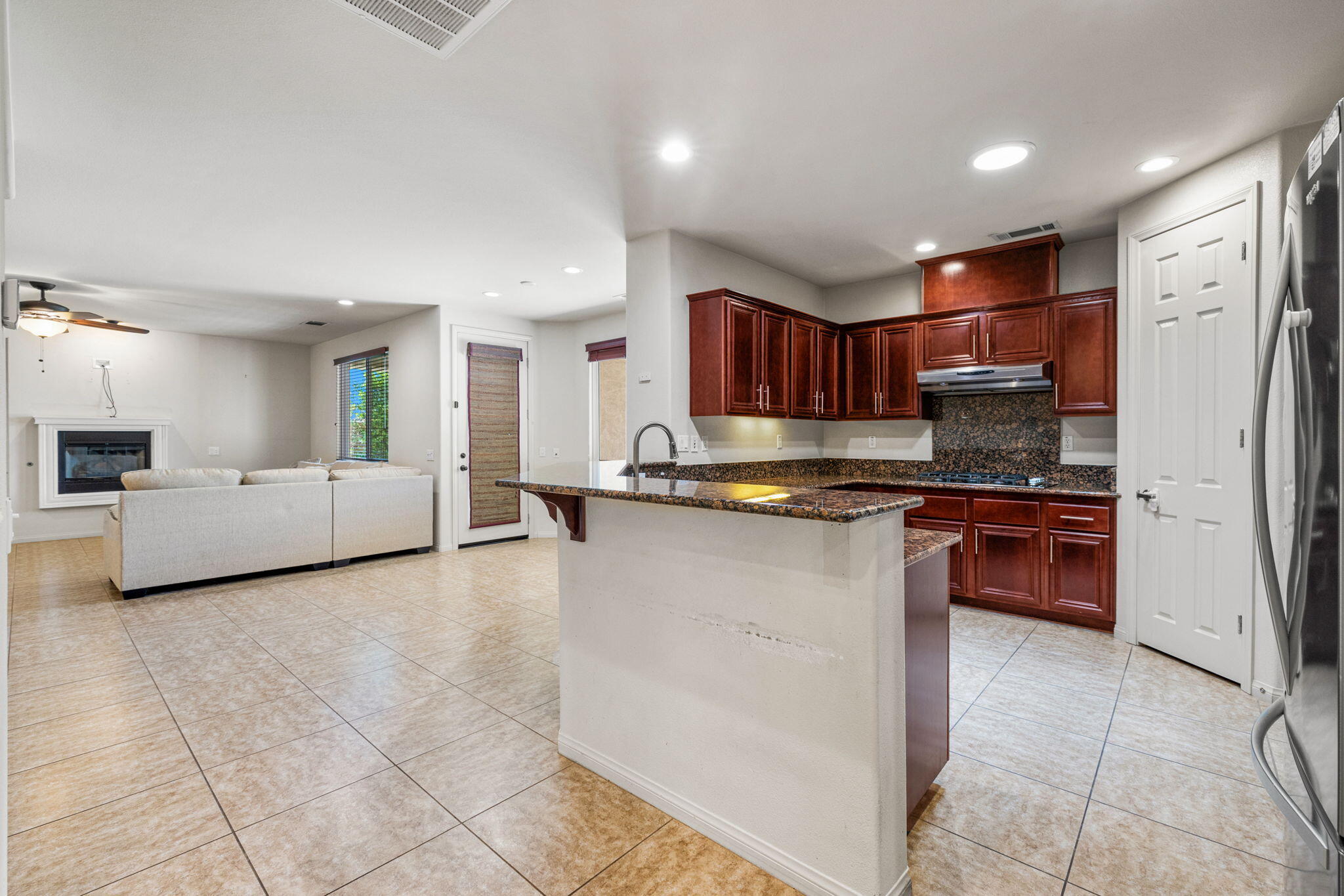 83725 Himalaya Drive Indio, CA 92203 - Photo 15 of 45 a large kitchen with a large counter top appliances and cabinets