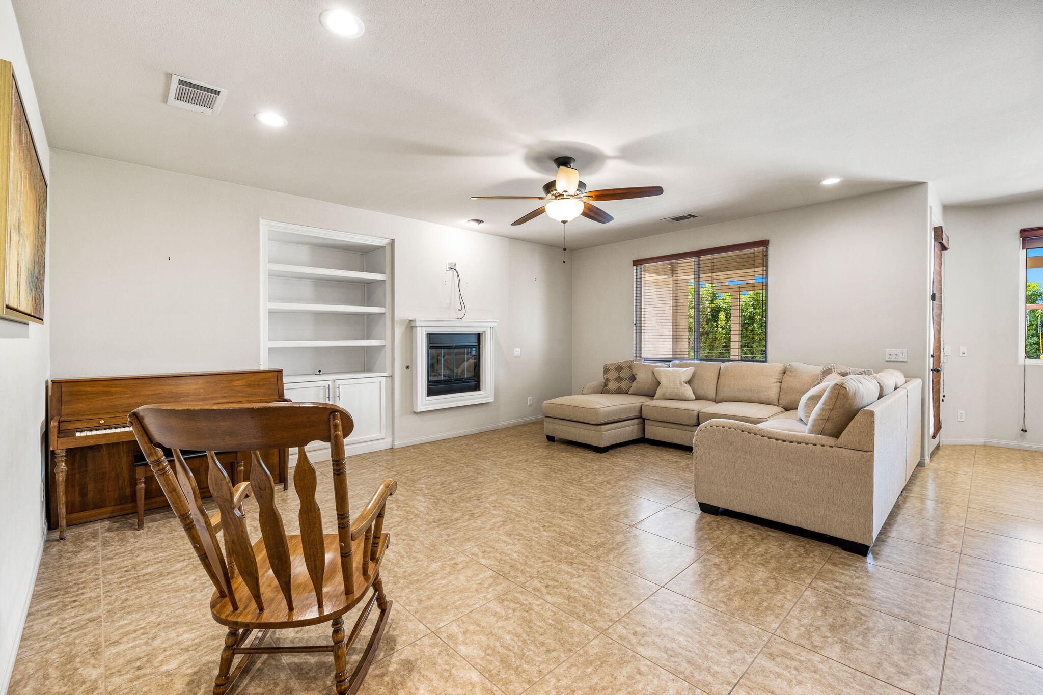 83725 Himalaya Drive Indio, CA 92203 - Photo 23 of 45 a living room with furniture and kitchen view