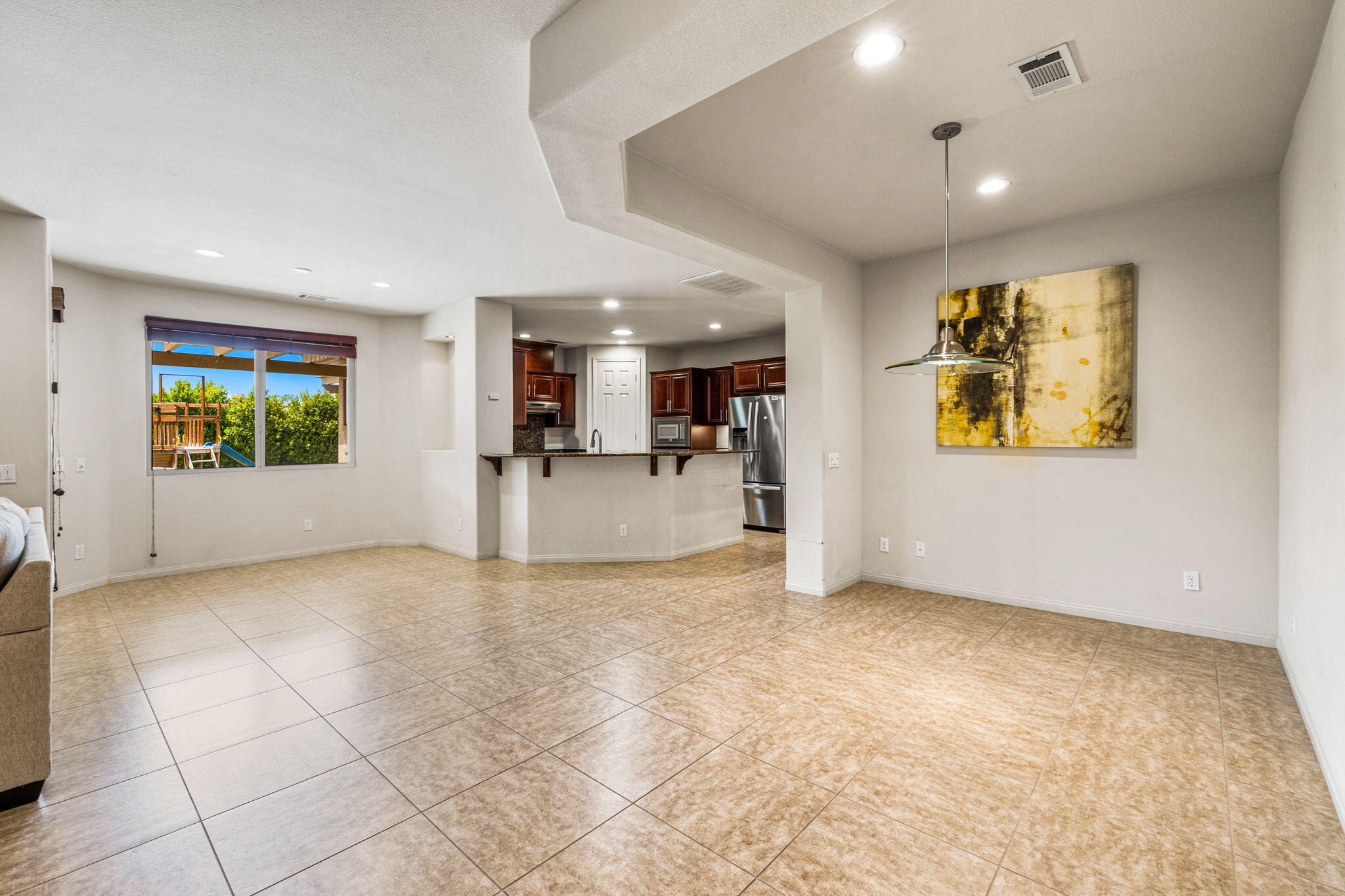 83725 Himalaya Drive Indio, CA 92203 - Photo 24 of 45 a view of livingroom with furniture and window