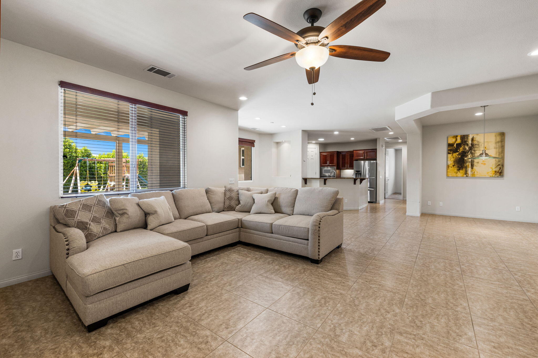 83725 Himalaya Drive Indio, CA 92203 - Photo 25 of 45 a living room with furniture and a large window