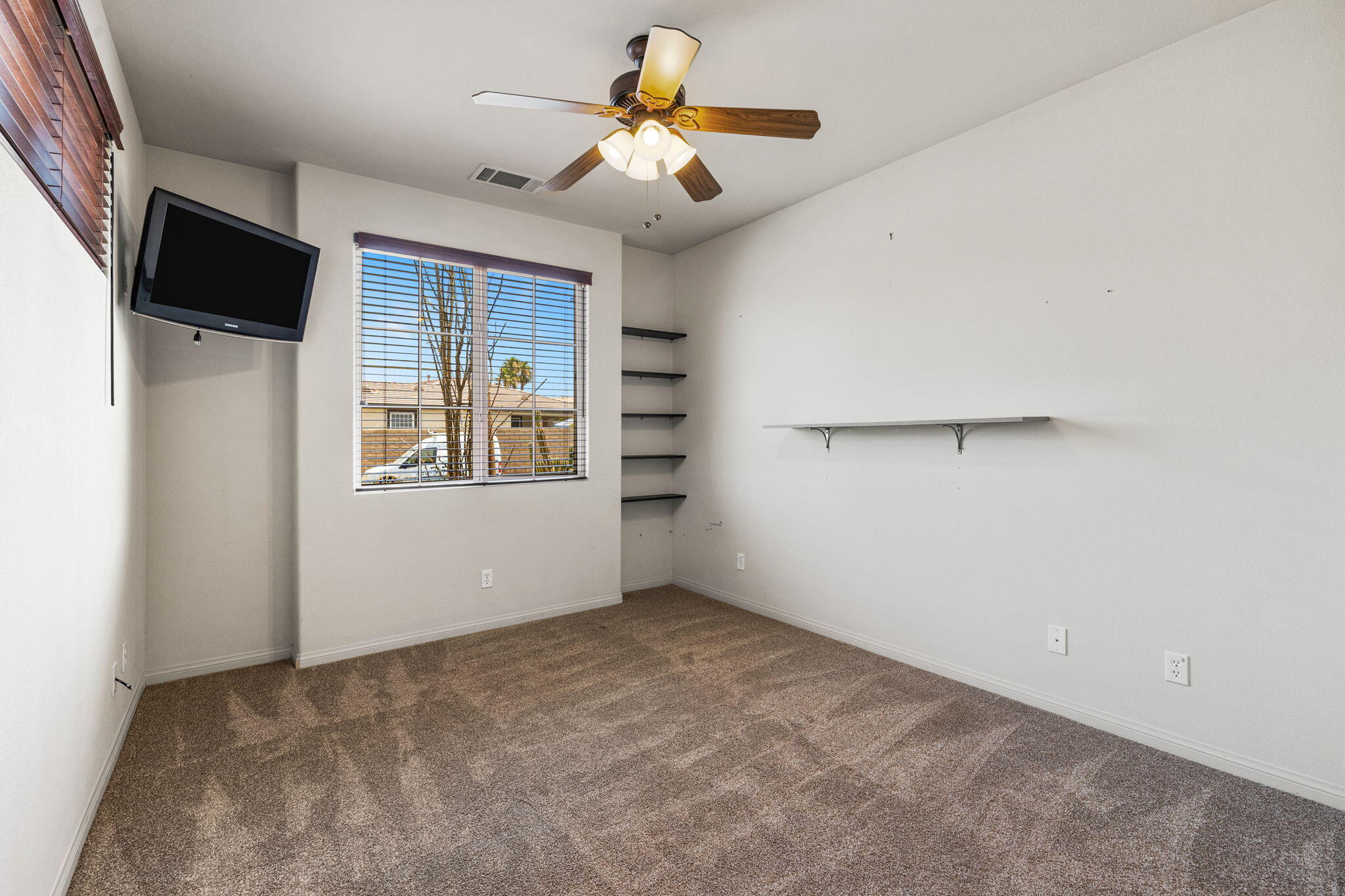 83725 Himalaya Drive Indio, CA 92203 - Photo 30 of 45 a view of livingroom with hardwood floor and ceiling fan