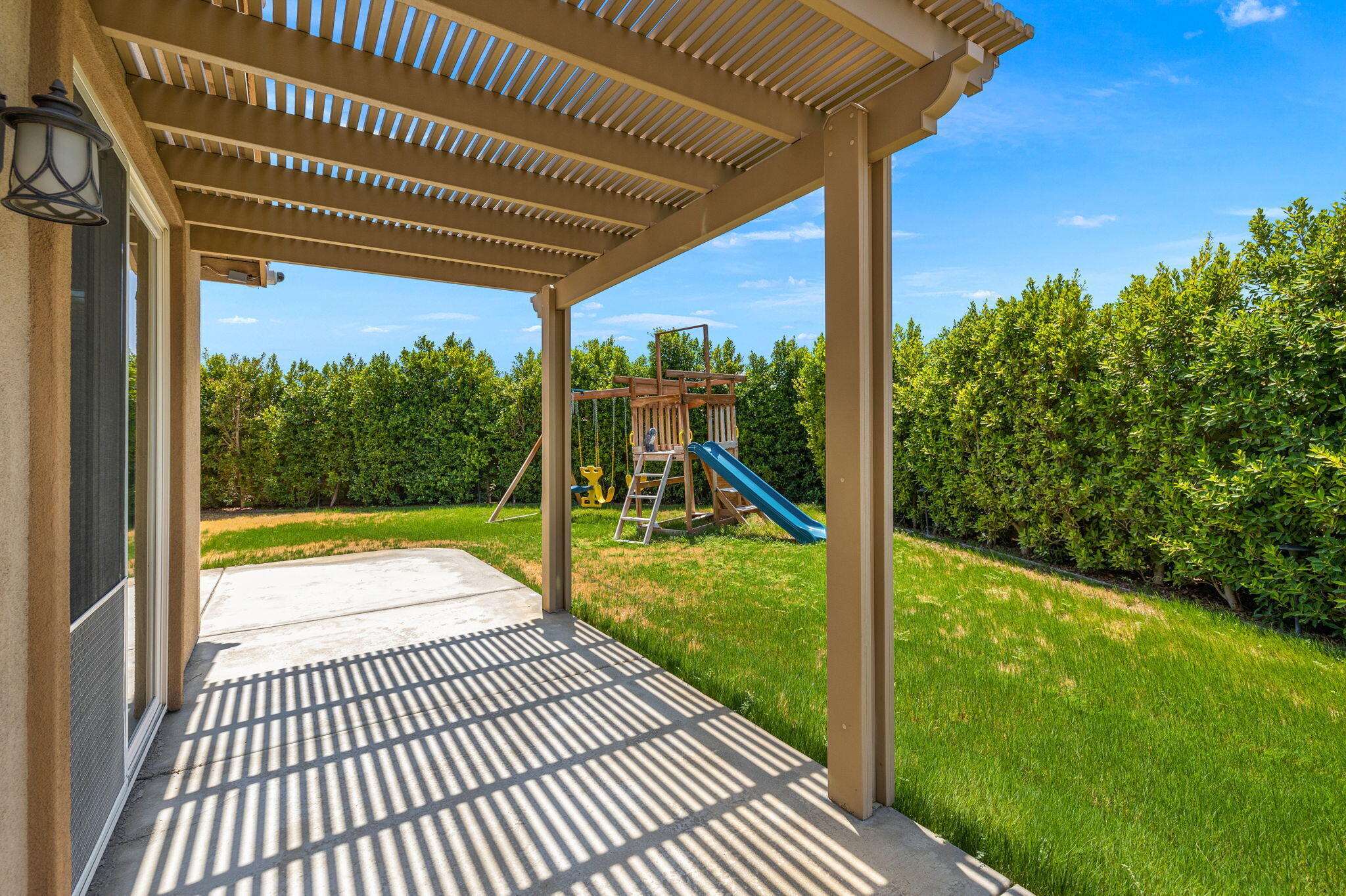 83725 Himalaya Drive Indio, CA 92203 - Photo 39 of 45 a view of porch with a garden