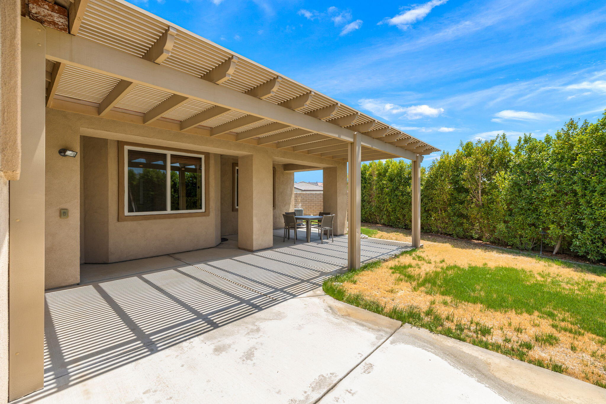 83725 Himalaya Drive Indio, CA 92203 - Photo 40 of 45 a view of backyard with large trees