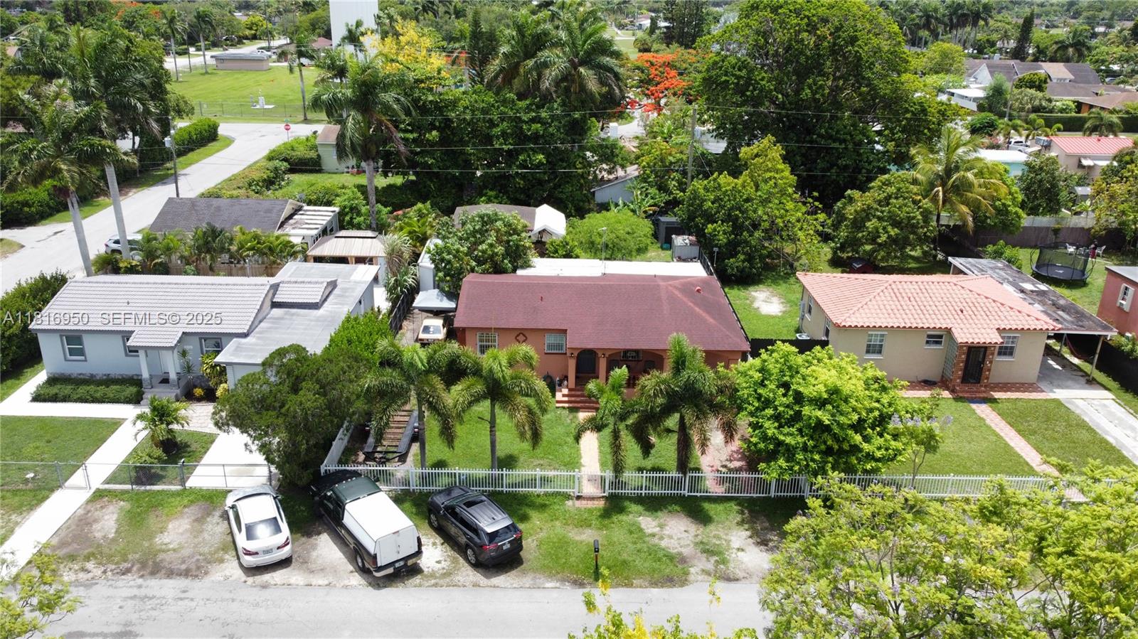 916 Northwest 3rd Avenue Homestead, FL 33030 - Photo 24 of 35 an aerial view of a house with a yard and lake view