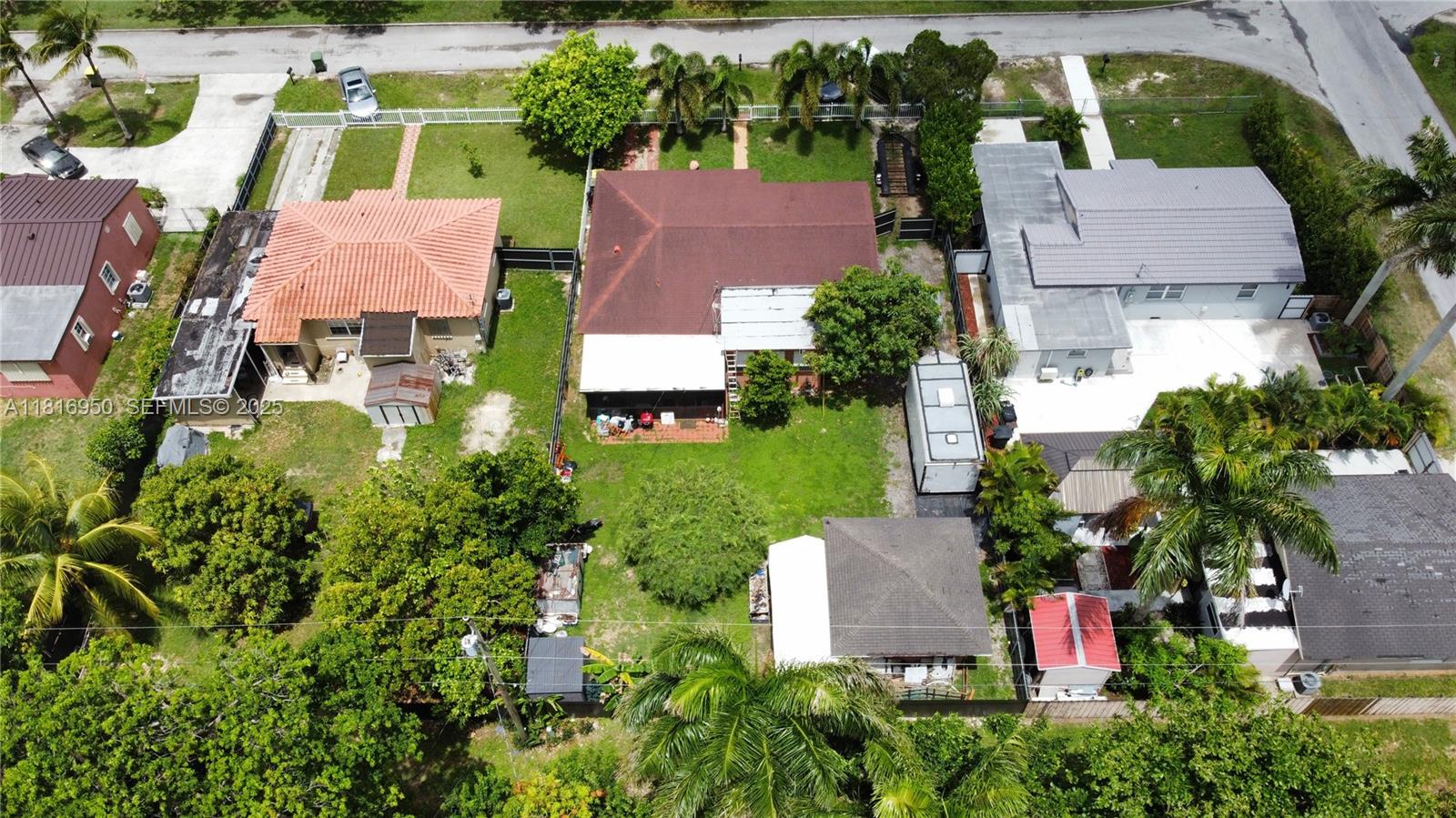 916 Northwest 3rd Avenue Homestead, FL 33030 - Photo 30 of 35 an aerial view of multiple houses with yard