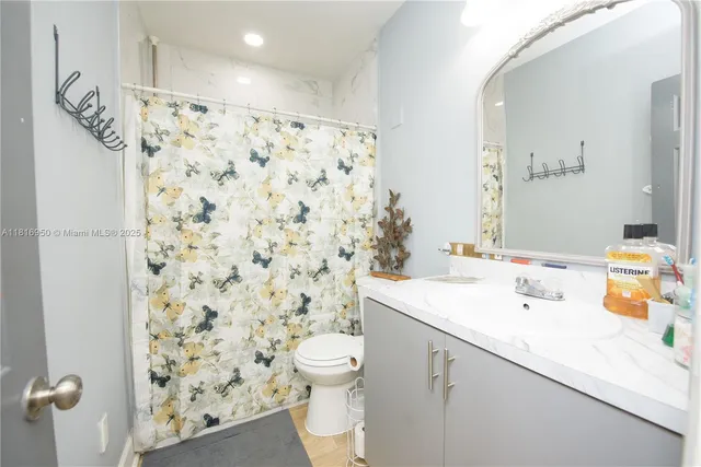 a bedroom with a bed and furniture