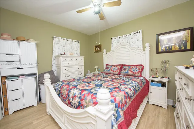 a kitchen with stainless steel appliances granite countertop a refrigerator sink and cabinets