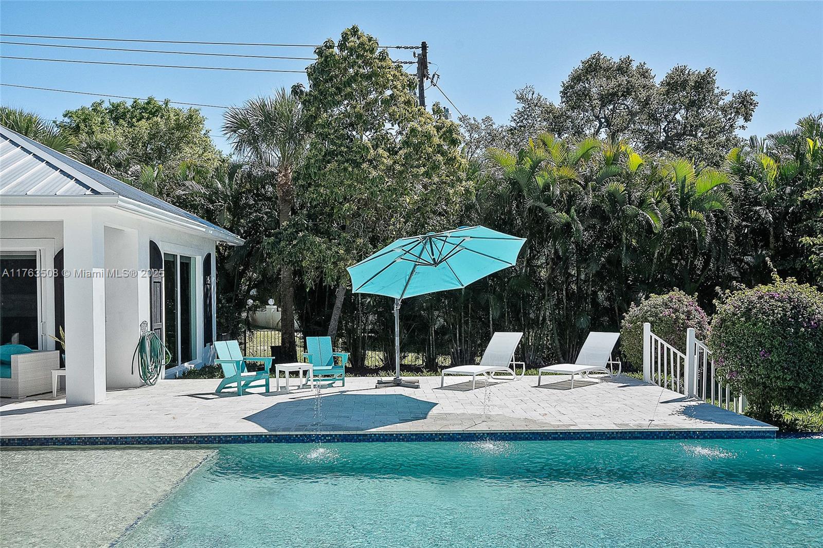 1350 Northwest Fork Road Stuart, FL 34994 - Photo 29 of 32 a outdoor view with patio