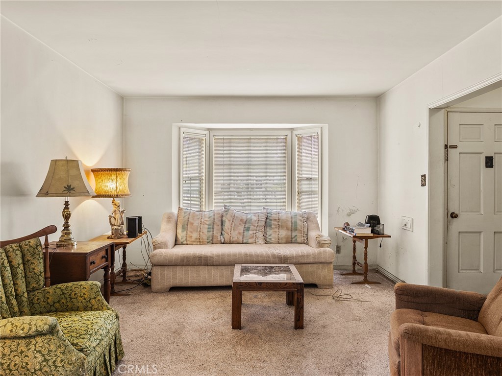 441 Dartmouth Road Burbank, CA 91504 - Photo 14 of 46 a living room with furniture and a large window