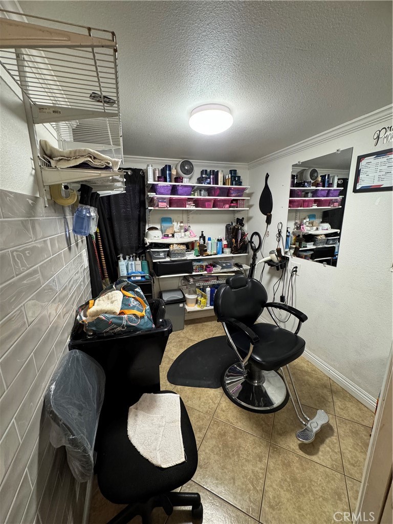 6045 Mission Boulevard, Unit 13 Riverside, CA 92509 - Photo 5 of 7 a view of a workspace with furniture