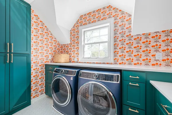 a utility room with dryer and washer