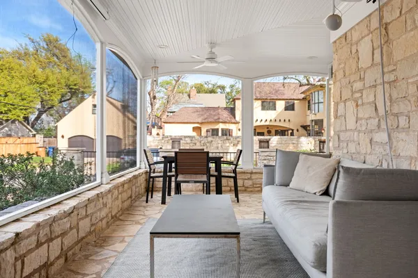 a view of a dining room with furniture window and outside view