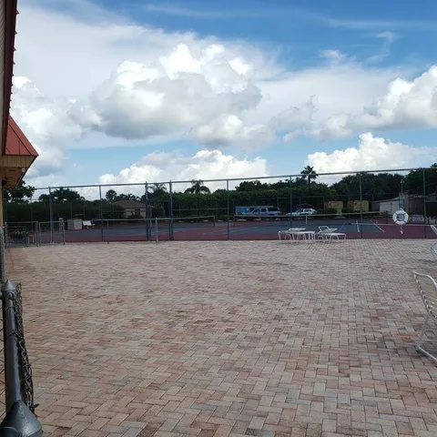 a kitchen with sink and window