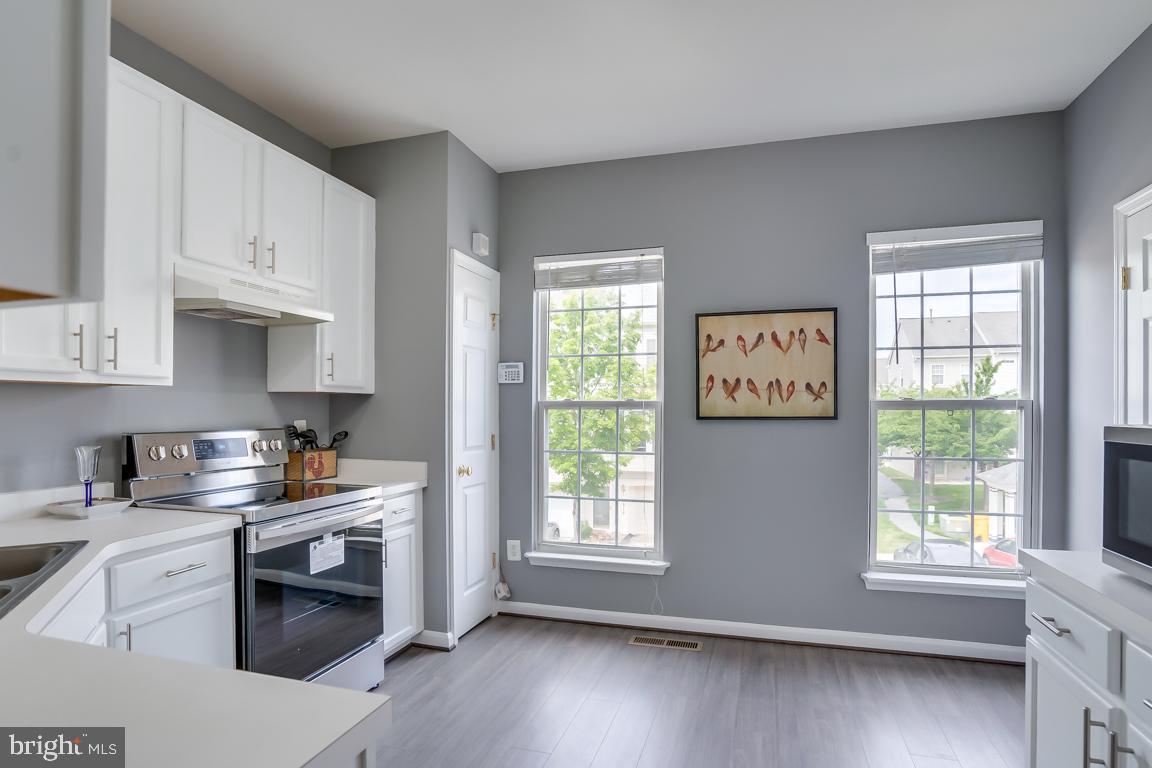 8316 Green Grass Road Laurel, MD 20724 - Photo 10 of 34 Sun-filled with pantry