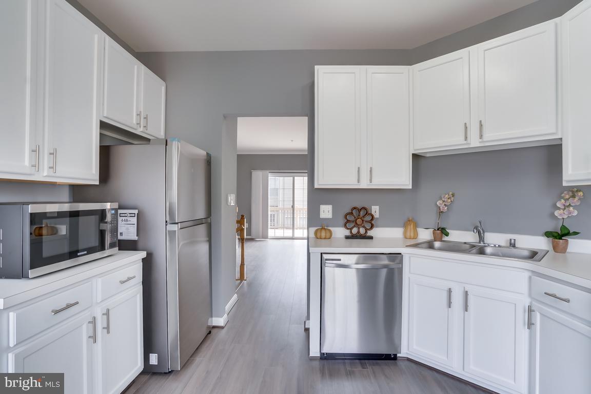 8316 Green Grass Road Laurel, MD 20724 - Photo 8 of 34 New stainless steel appliances