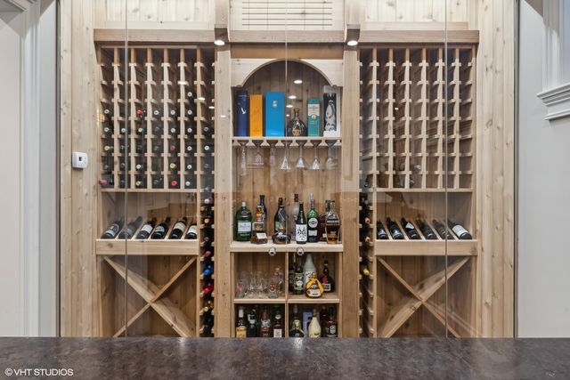 a utility room with sink dryer and washer