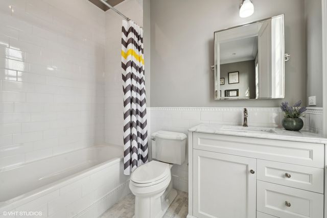 a outdoor living space with patio furniture and a fireplace