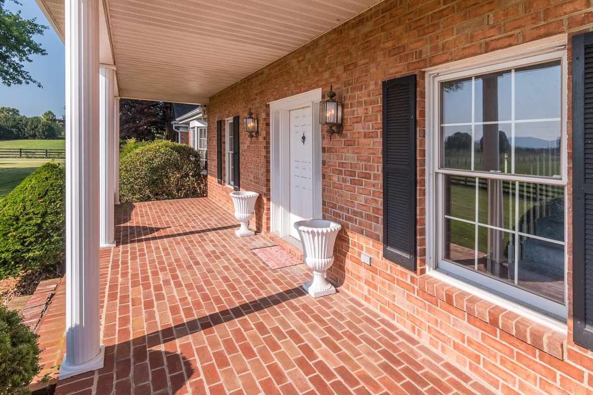 158 Battlefield Road Waynesboro, VA 22980 - Photo 19 of 50 a view of a house with backyard and sitting area