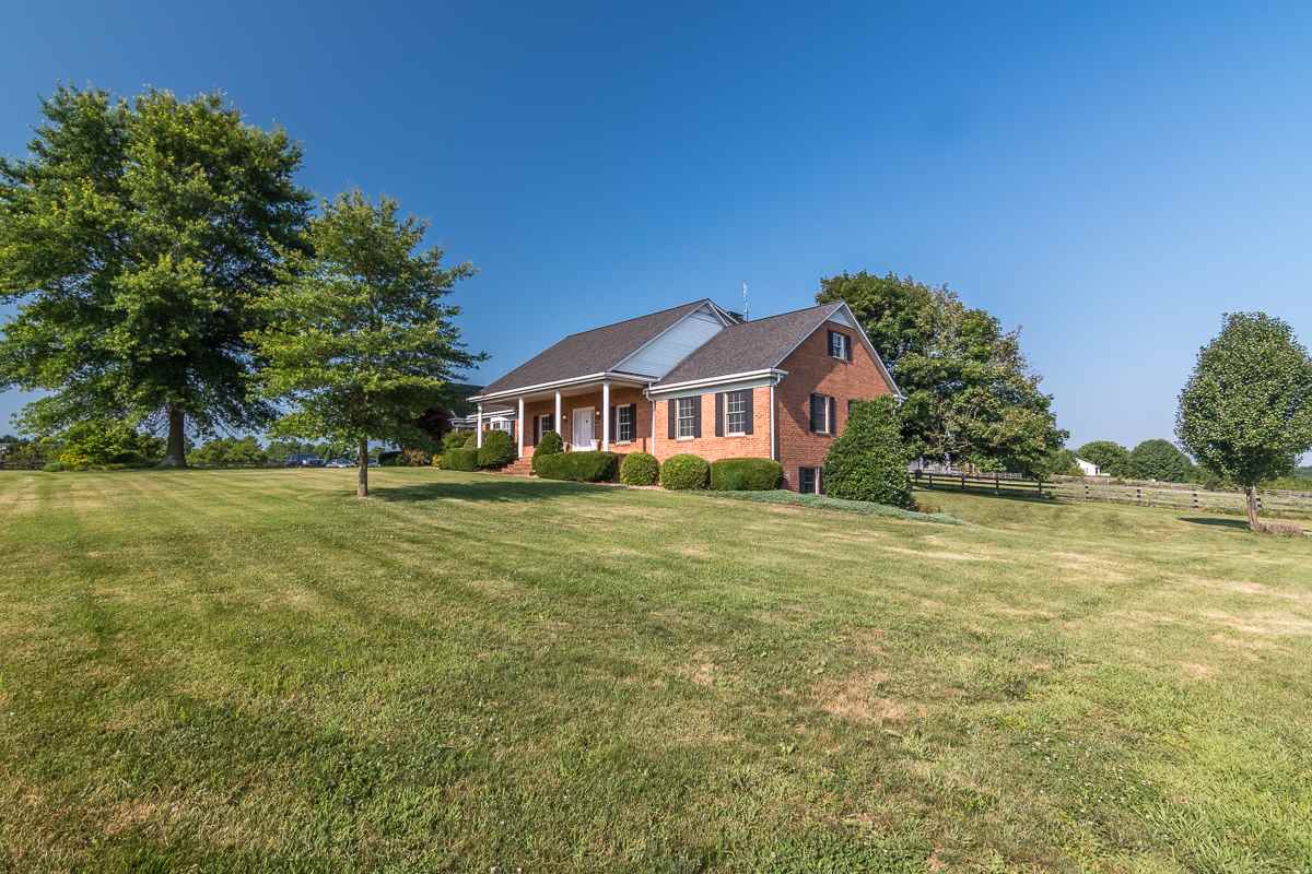 158 Battlefield Road Waynesboro, VA 22980 - Photo 2 of 50 a front view of a house with a yard