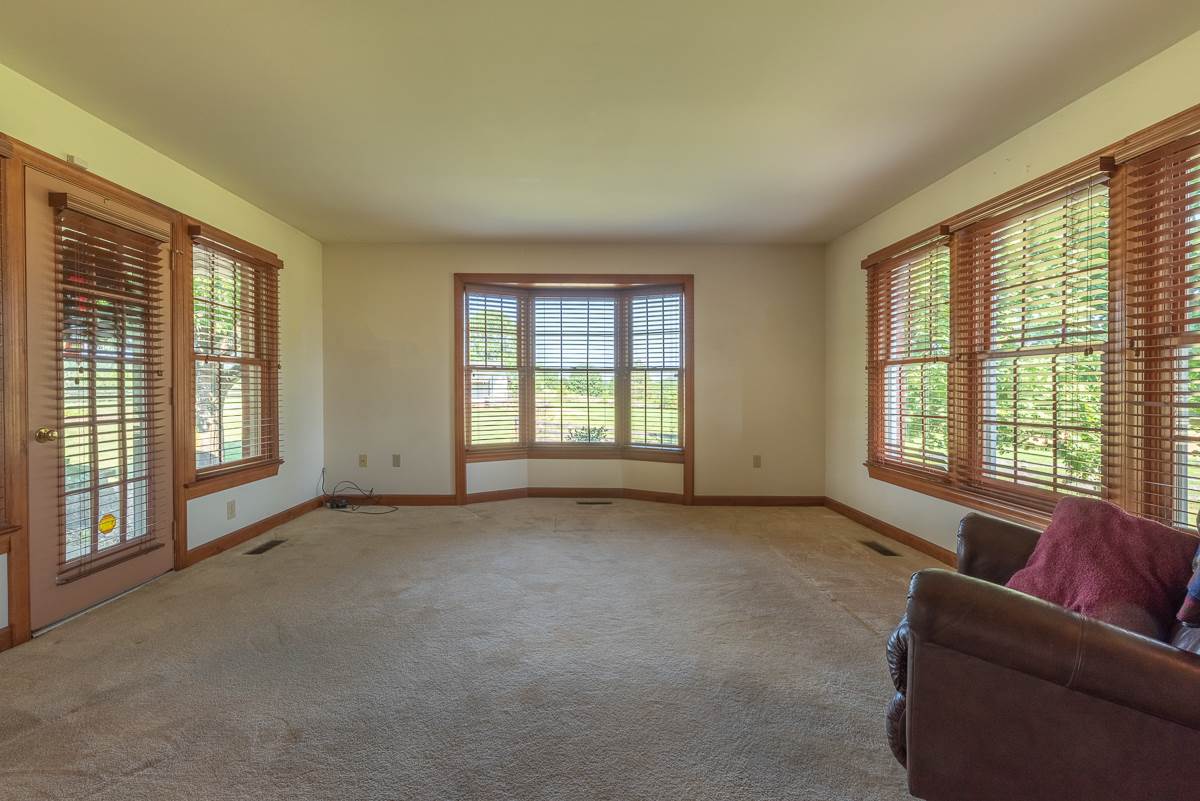 158 Battlefield Road Waynesboro, VA 22980 - Photo 30 of 50 a living room with furniture and large windows