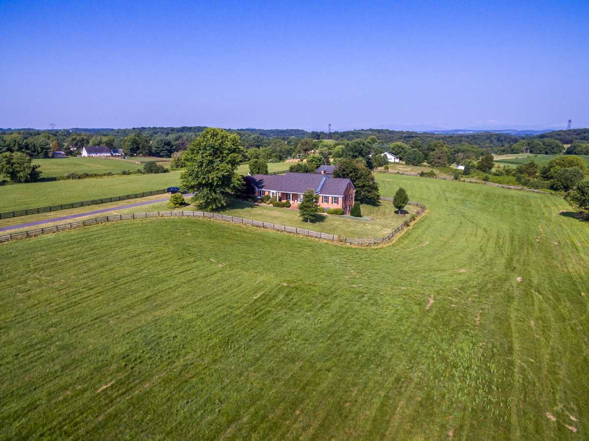 158 Battlefield Road Waynesboro, VA 22980 - Photo 3 of 50 a view of a lake with houses in the back