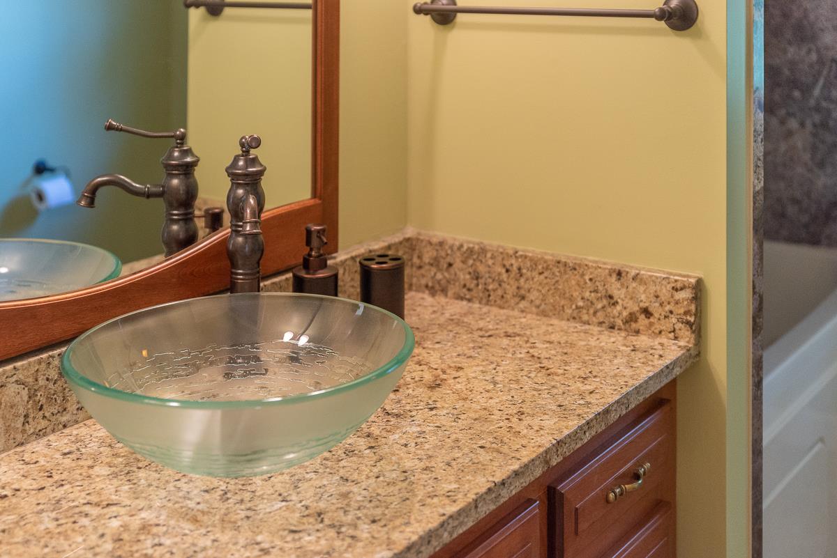 158 Battlefield Road Waynesboro, VA 22980 - Photo 42 of 50 a bathroom with a granite countertop sink and a mirror