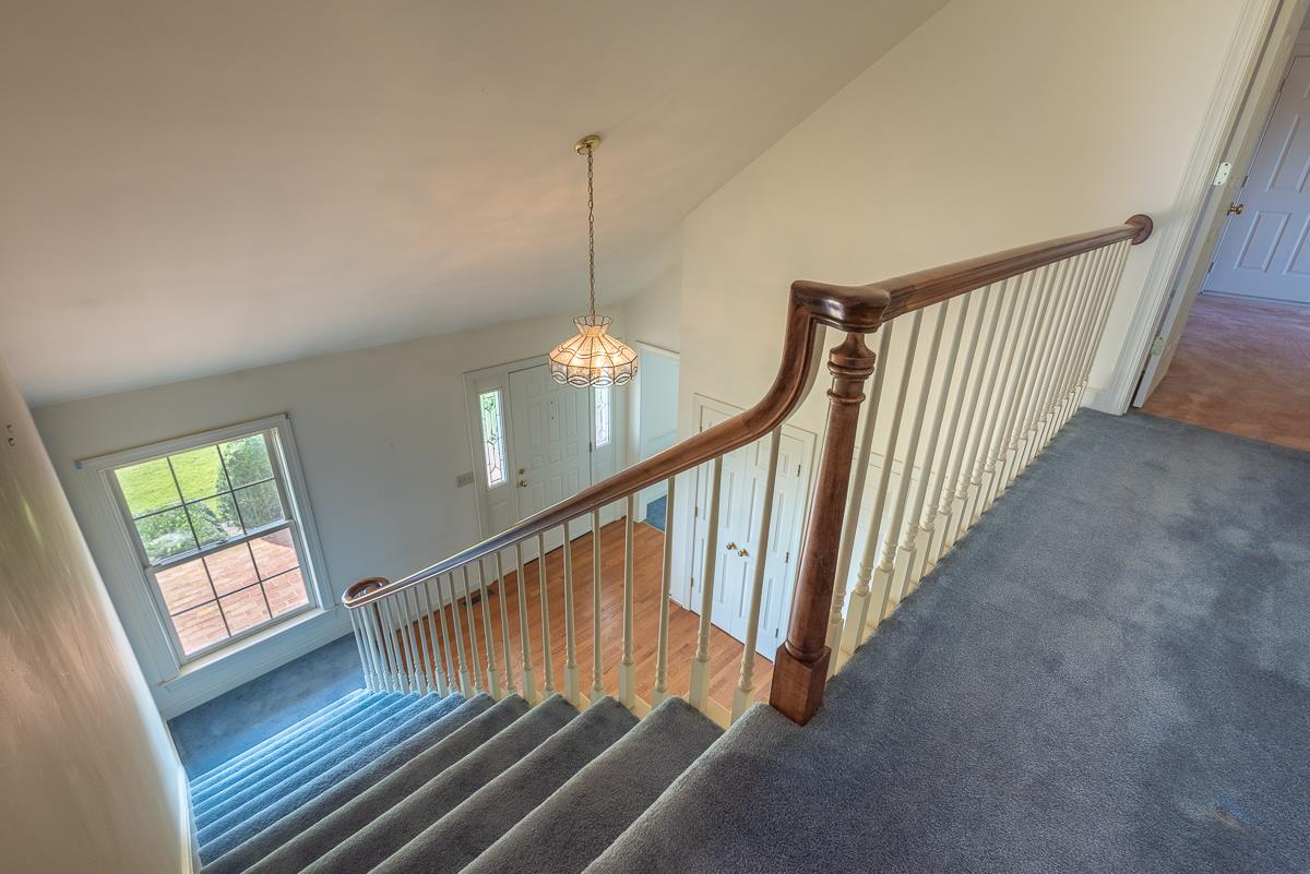 158 Battlefield Road Waynesboro, VA 22980 - Photo 44 of 50 a view of staircase with wooden floor and white walls