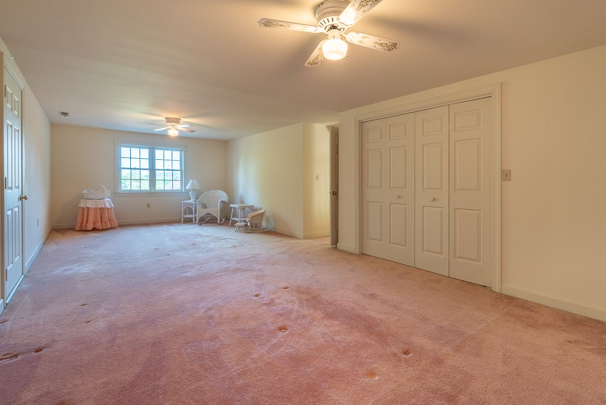 158 Battlefield Road Waynesboro, VA 22980 - Photo 46 of 50 an empty room with windows and fan