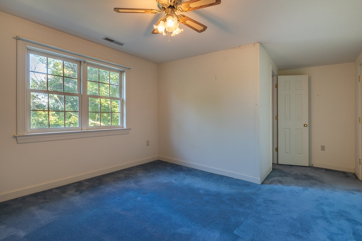 158 Battlefield Road Waynesboro, VA 22980 - Photo 48 of 50 an empty room with a window and a fan