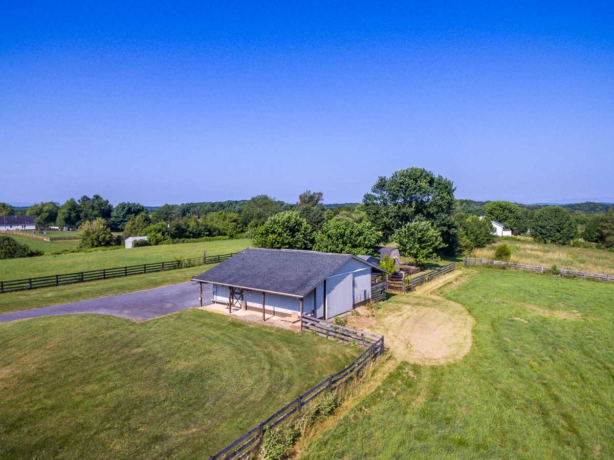 158 Battlefield Road Waynesboro, VA 22980 - Photo 8 of 50 a view of a swimming pool with a yard and mountain