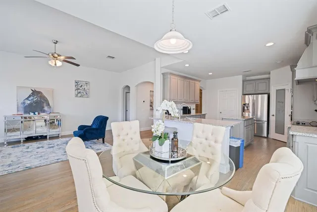 a view of a dining room with furniture