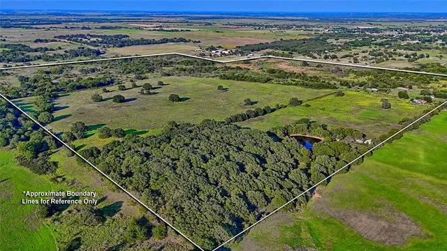 an aerial view of a golf course with a yard
