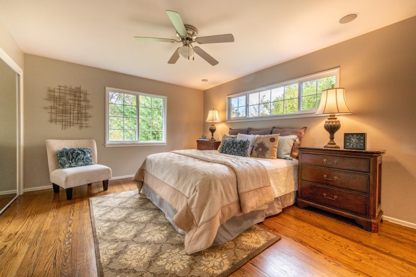 500 Yale Drive San Mateo, CA 94402 - Photo 14 of 35 a bedroom with a bed and wooden floor