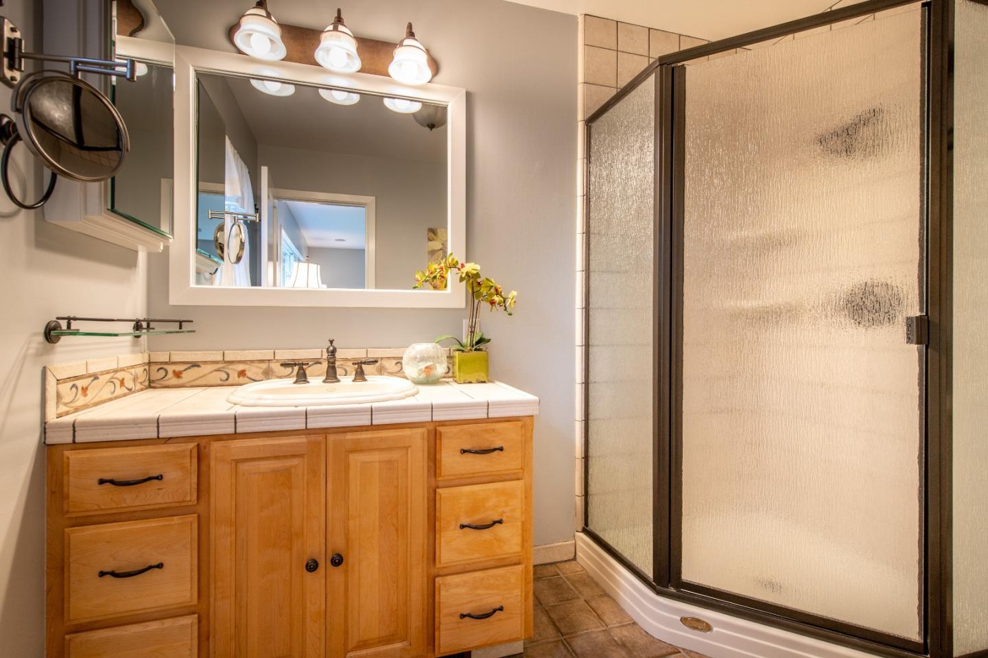 500 Yale Drive San Mateo, CA 94402 - Photo 15 of 35 a bathroom with a sink and a mirror